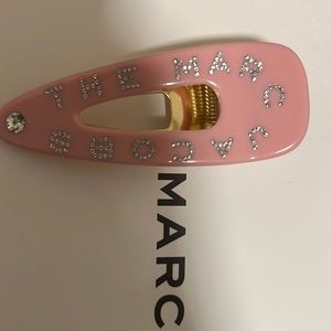 Marc Jacobs pink hair clip.